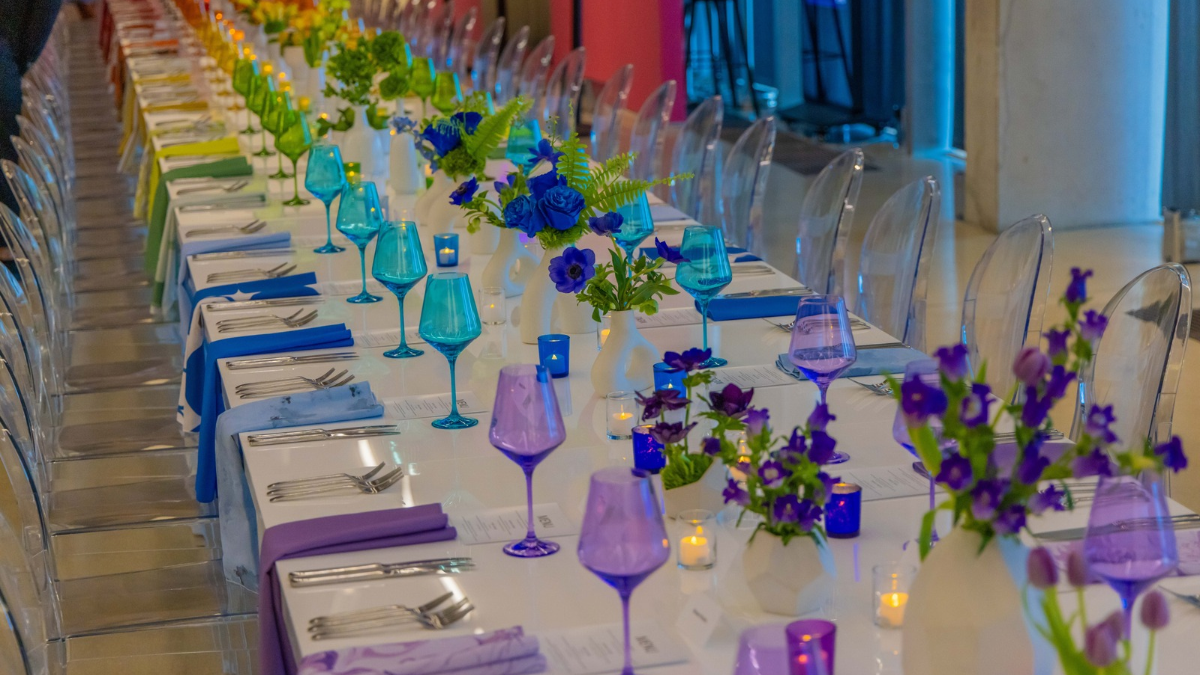 Table scape of rainbow glassware 