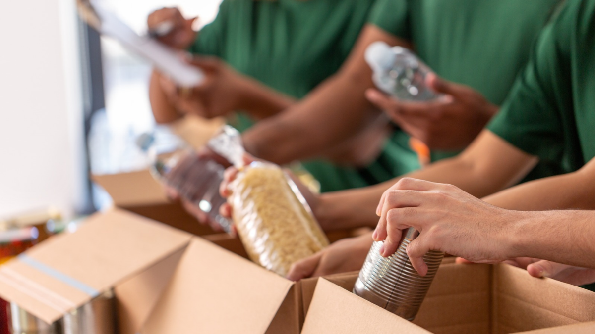 People packing food into boxes