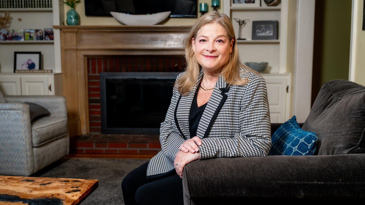 Sharon Crichton sitting in the living room