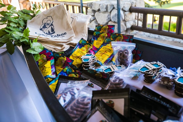 Welcome gifts arranged in a wooden canoe. 