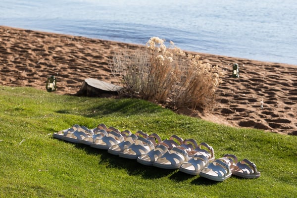 Outdoor lounge cushions beside the beach. 