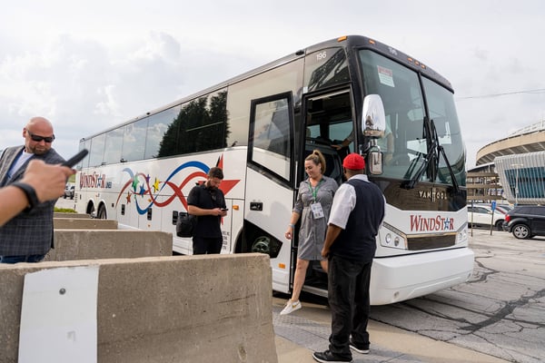 Guests arriving by charter bus.