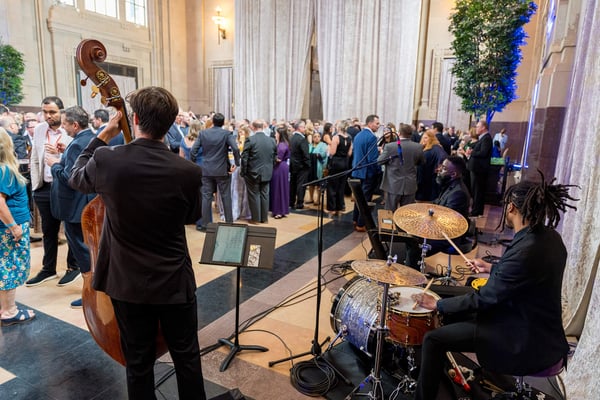 Live band performing during a reception.