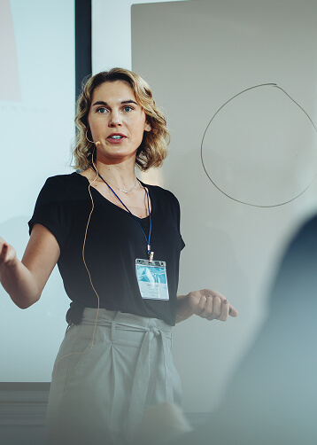 woman giving a conference