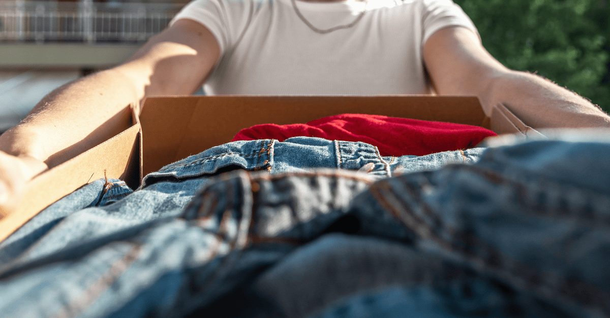 Box of clothing ready for donation.