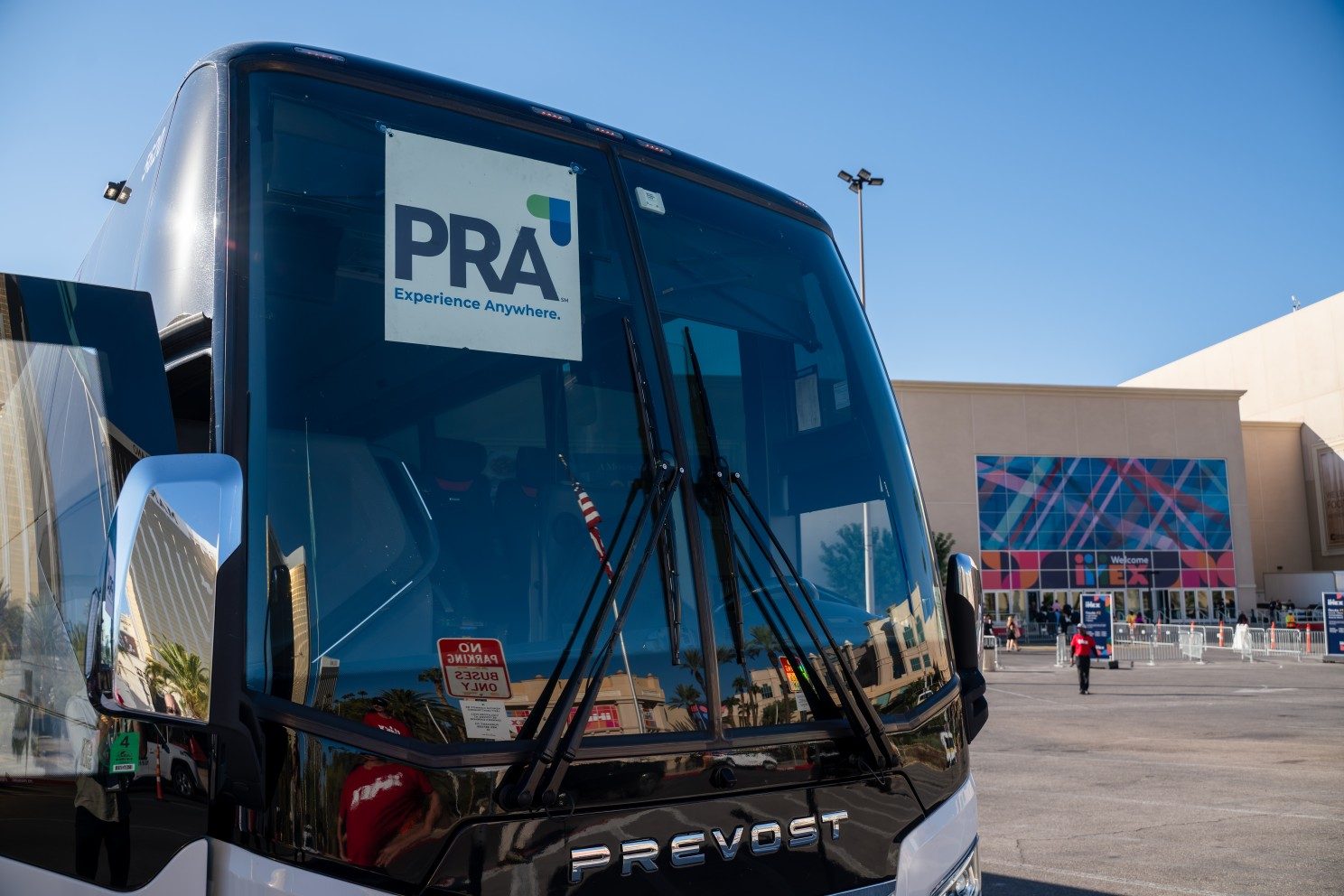 PRA shuttle bus outside the IMEX venue.