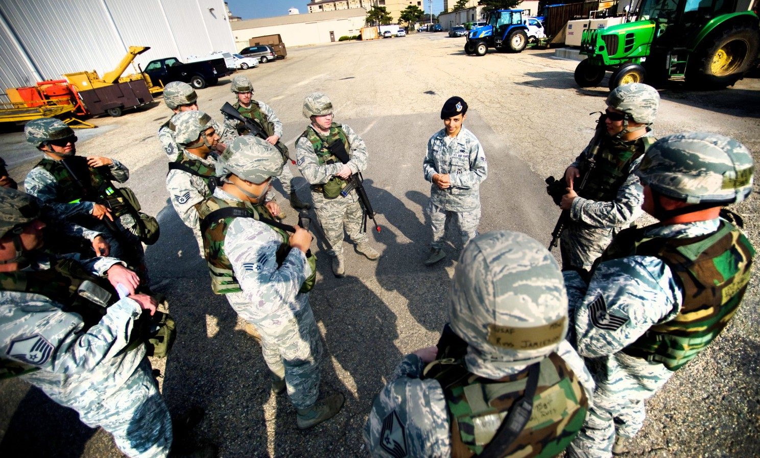 U.S. Air Force service members gather for a briefing.