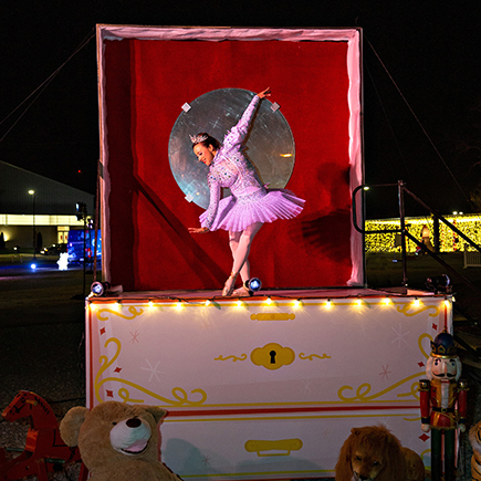 Ballerina dancing for Amazon Holiday Drive Thru